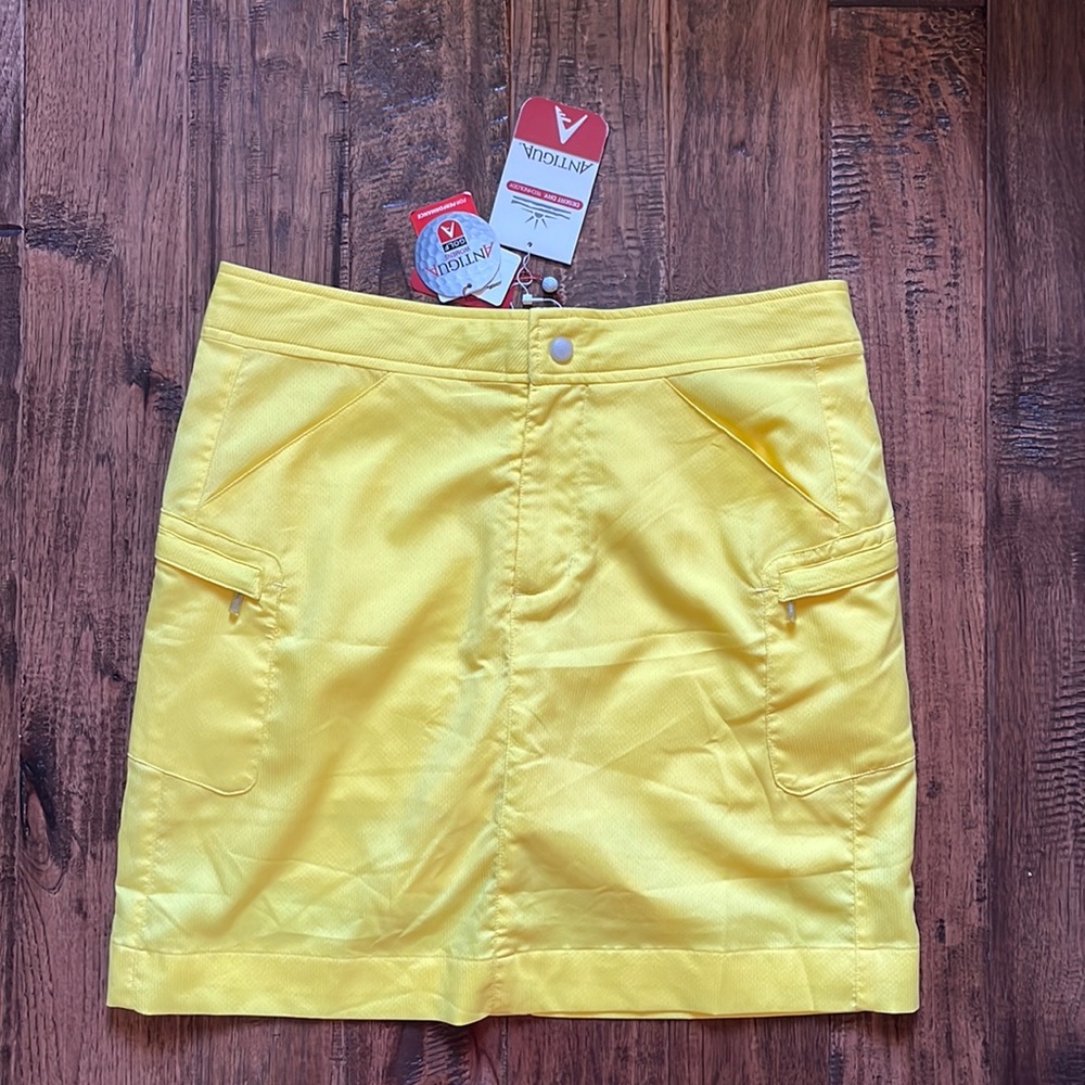 Antigua golf skirt, yellow, size 8. NWT.